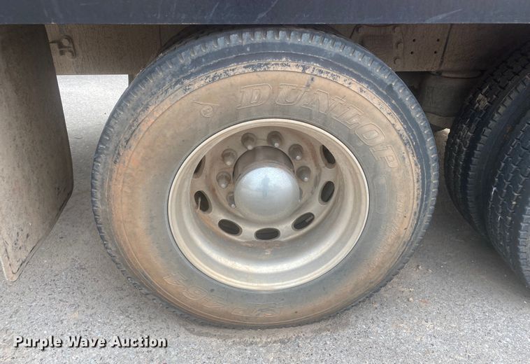 image for item DL6167 2012 Peterbilt 388  flatbed truck with mud mixer