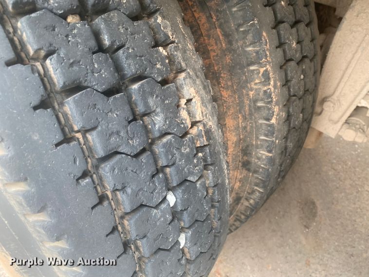 image for item DL6167 2012 Peterbilt 388  flatbed truck with mud mixer