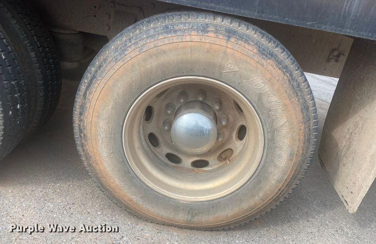 image for item DL6167 2012 Peterbilt 388  flatbed truck with mud mixer