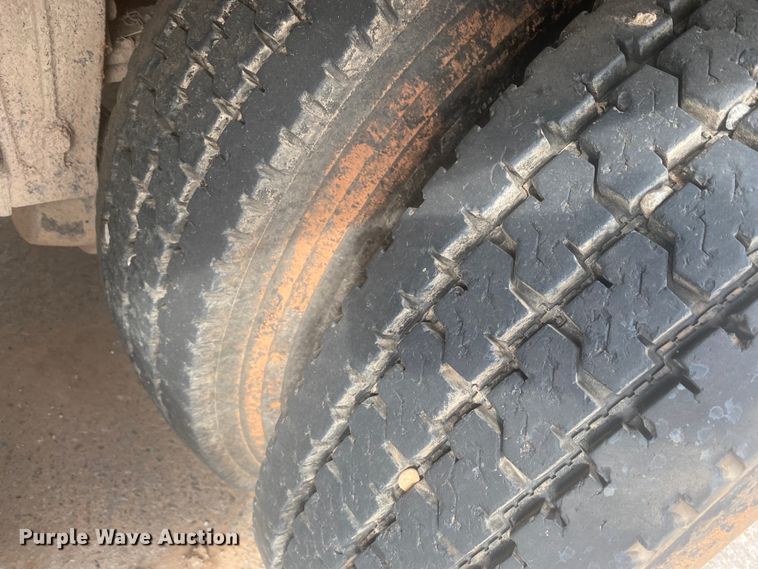 image for item DL6167 2012 Peterbilt 388  flatbed truck with mud mixer