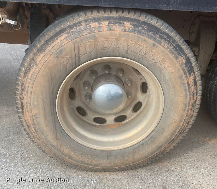 image for item DL6167 2012 Peterbilt 388  flatbed truck with mud mixer