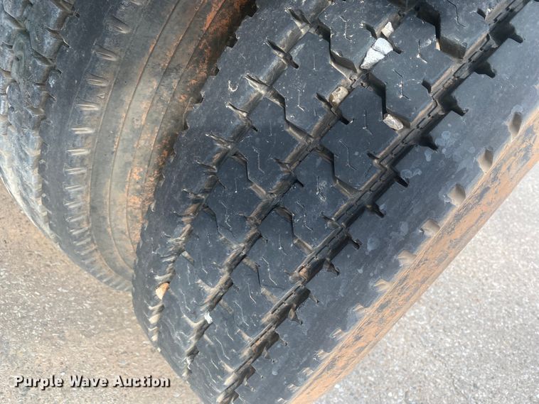 image for item DL6167 2012 Peterbilt 388  flatbed truck with mud mixer