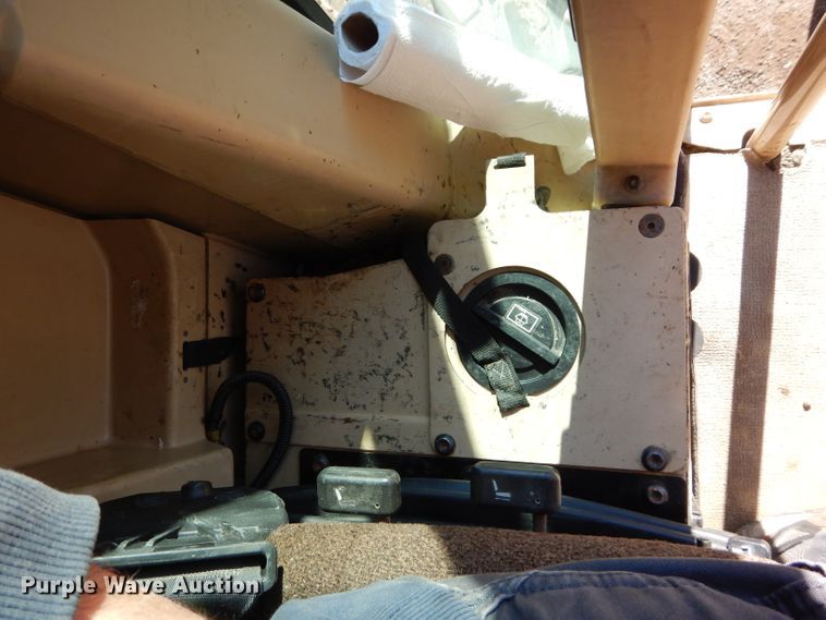 image for item DM0735 2000 Caterpillar 143H  motor grader