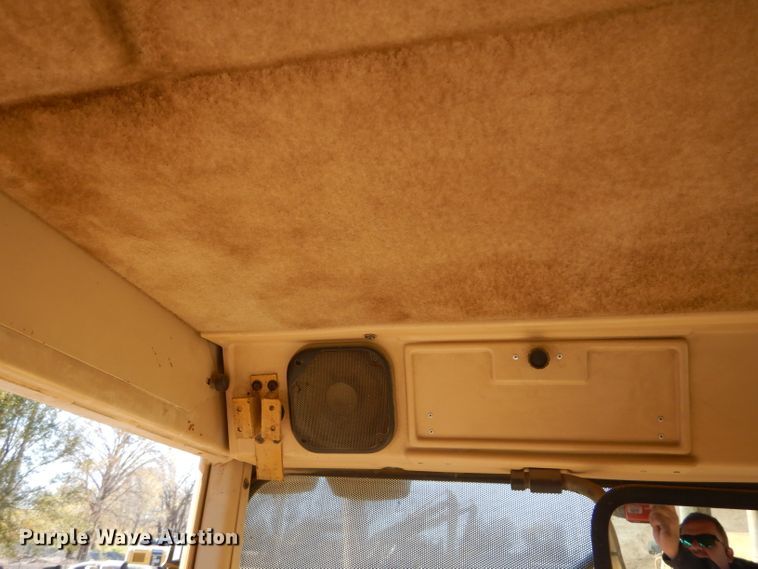 image for item DM0735 2000 Caterpillar 143H  motor grader