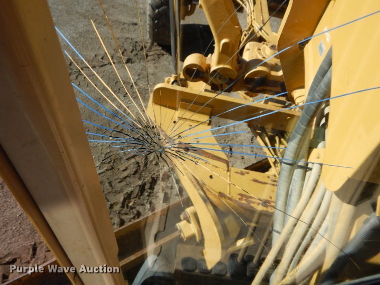 image for item DM0735 2000 Caterpillar 143H  motor grader