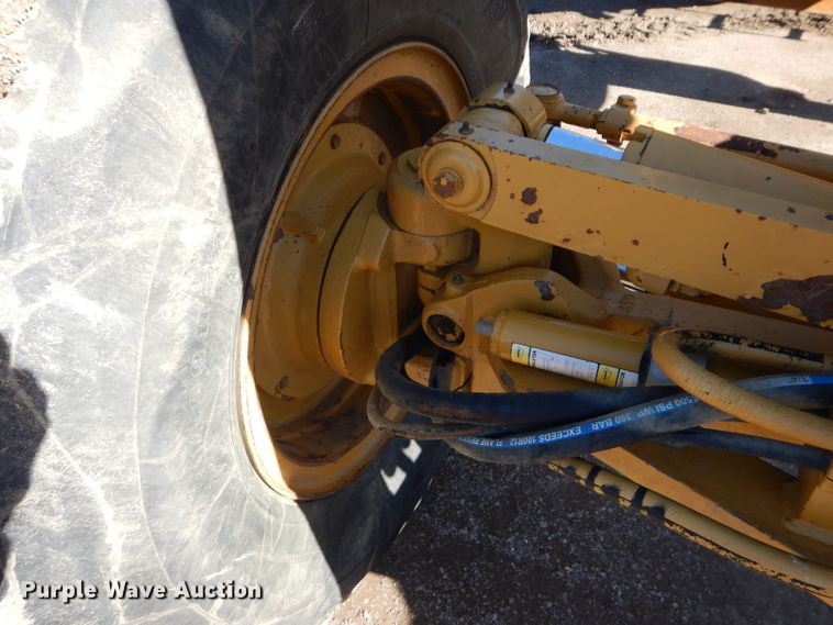 image for item DM0735 2000 Caterpillar 143H  motor grader