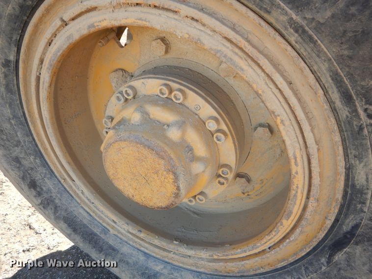 image for item DM0735 2000 Caterpillar 143H  motor grader