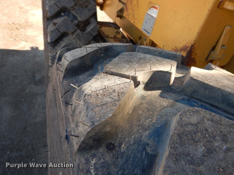 image for item DM0735 2000 Caterpillar 143H  motor grader