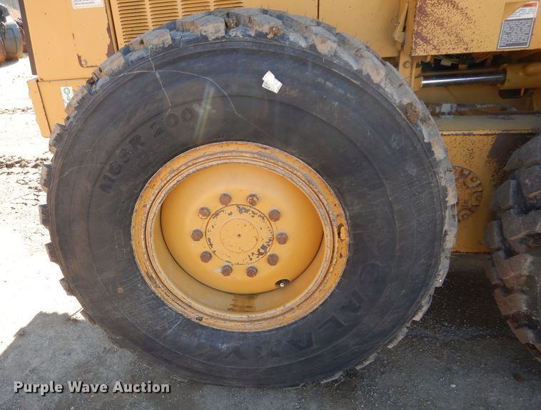 image for item DM0735 2000 Caterpillar 143H  motor grader