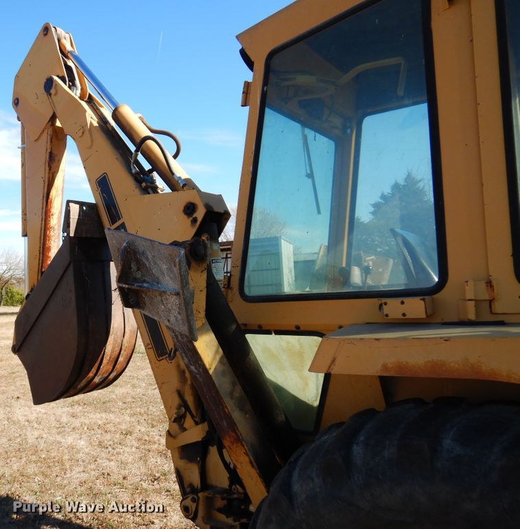 image for item JJ9899 Ford 555  backhoe