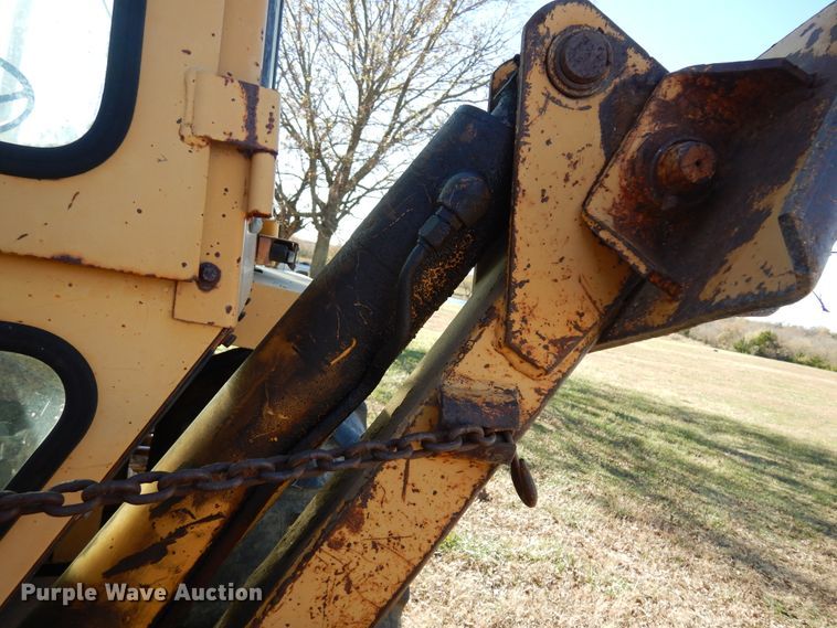 image for item JJ9899 Ford 555  backhoe