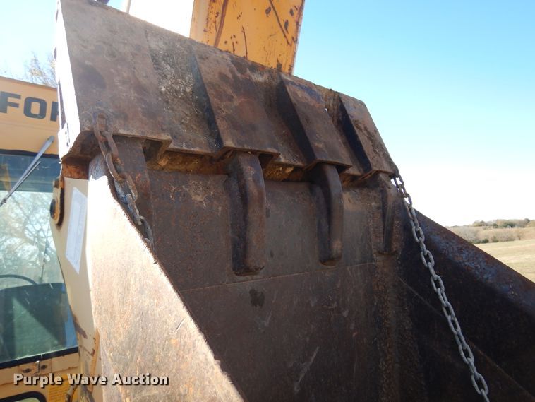 image for item JJ9899 Ford 555  backhoe