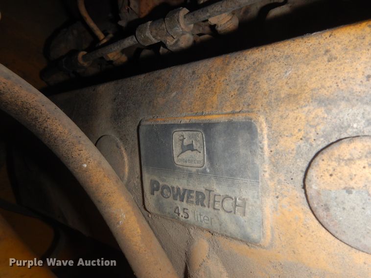 image for item JZ9791 1999 John Deere 310SE  backhoe