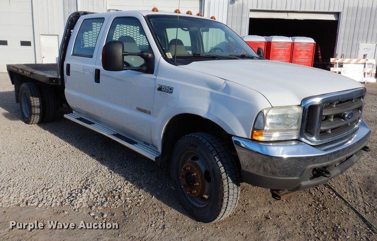 image for item KH9153 2003 Ford F550 Super Duty  Crew Cab flatbed truck