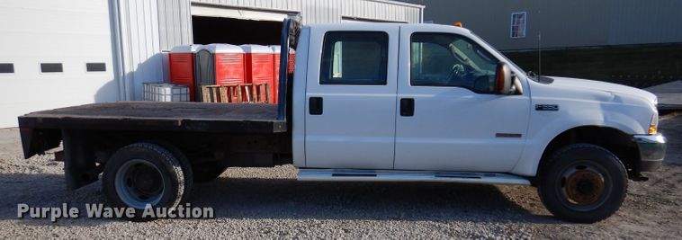 image for item KH9153 2003 Ford F550 Super Duty  Crew Cab flatbed truck