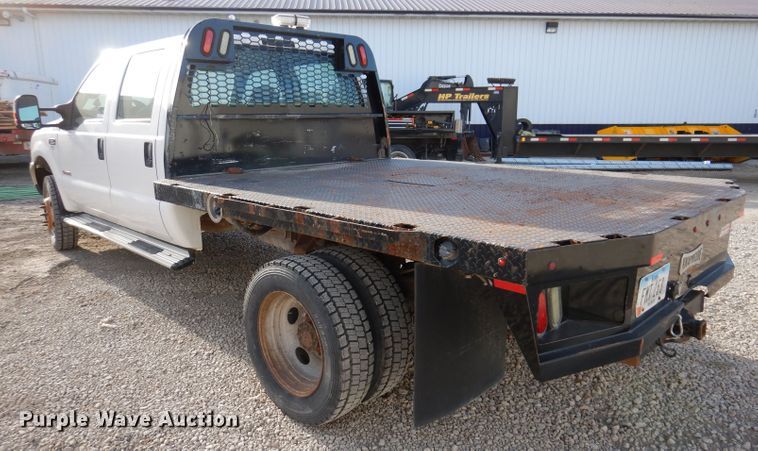 image for item KH9153 2003 Ford F550 Super Duty  Crew Cab flatbed truck