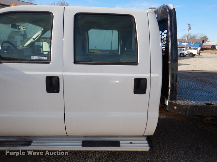 image for item KH9153 2003 Ford F550 Super Duty  Crew Cab flatbed truck