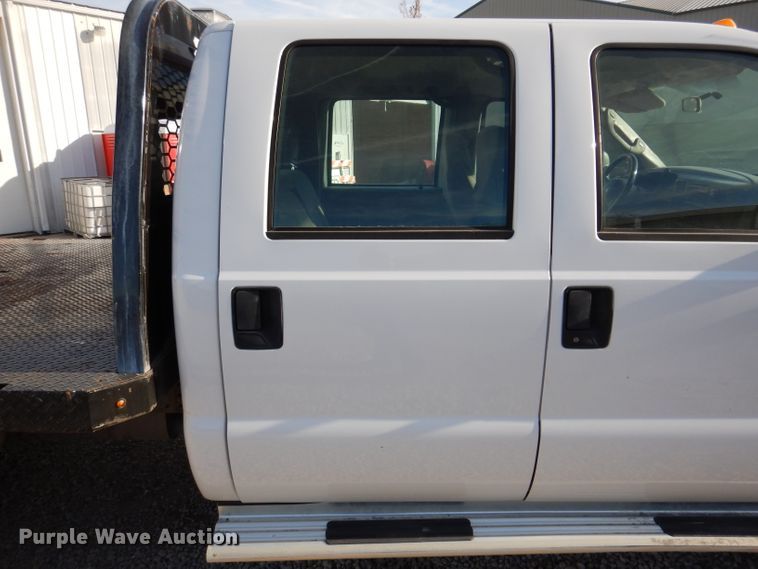 image for item KH9153 2003 Ford F550 Super Duty  Crew Cab flatbed truck