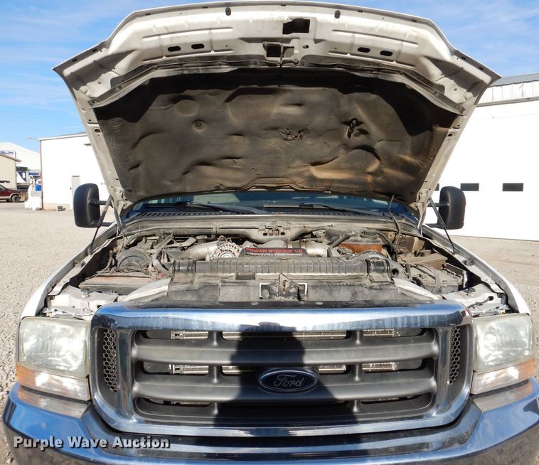 image for item KH9153 2003 Ford F550 Super Duty  Crew Cab flatbed truck