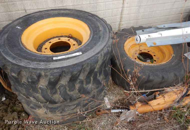 image for item KH9155 (5) 12-16.5 tires and wheels