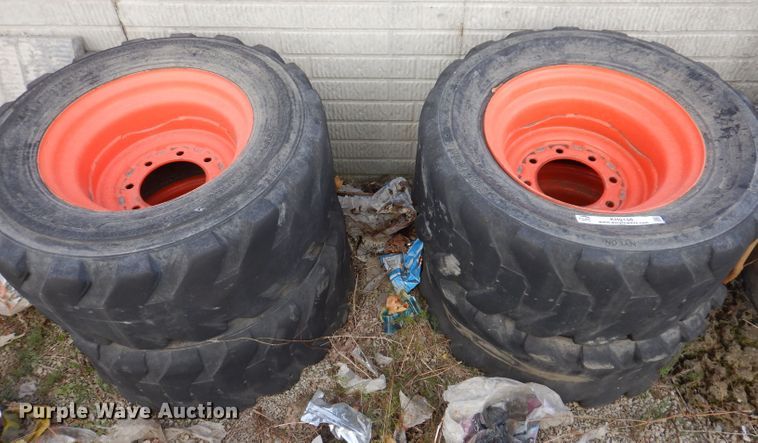 image for item KH9156 (4) 12-16.5 tires and wheels