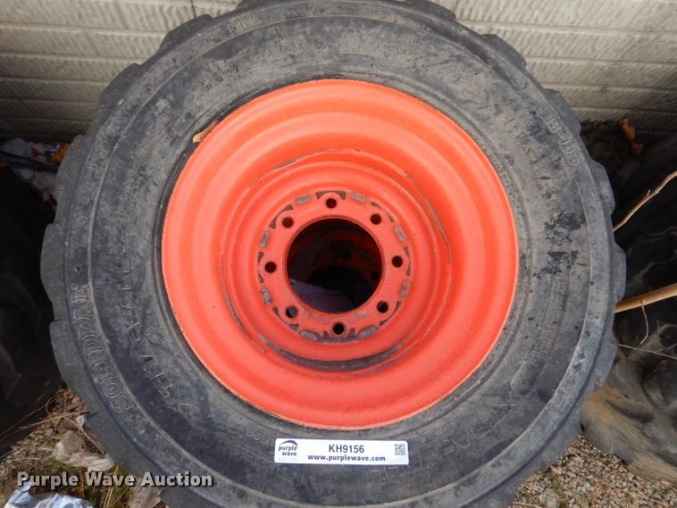 image for item KH9156 (4) 12-16.5 tires and wheels