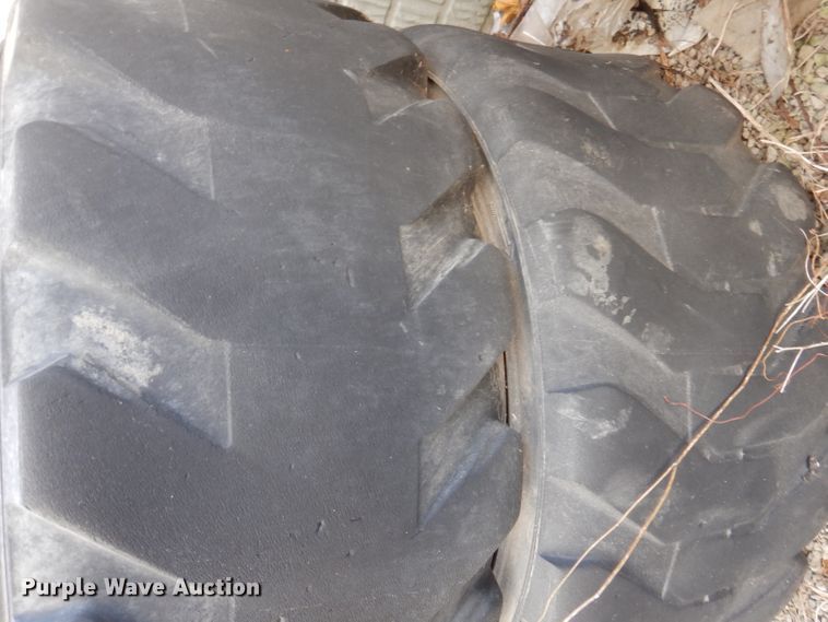 image for item KH9156 (4) 12-16.5 tires and wheels