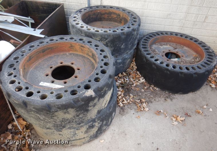 image for item KH9157 (5) 10-16.5 tires and wheels