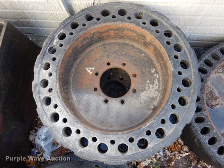 image for item KH9157 (5) 10-16.5 tires and wheels