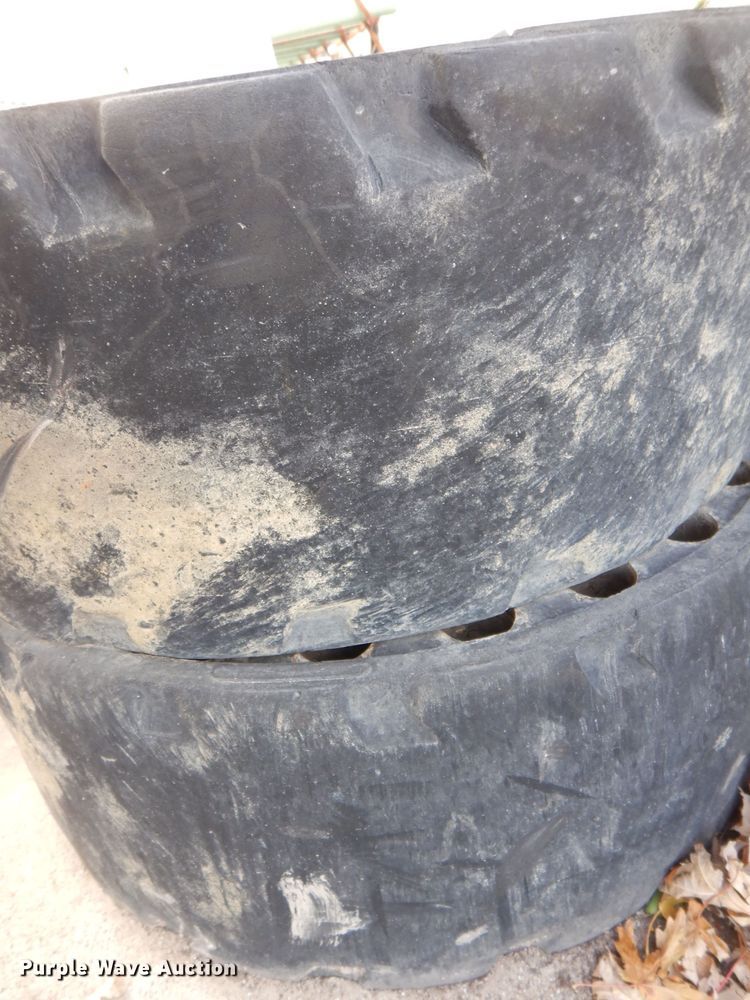 image for item KH9157 (5) 10-16.5 tires and wheels