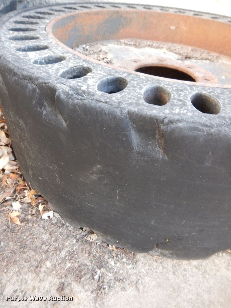 image for item KH9157 (5) 10-16.5 tires and wheels