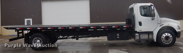 image for item KK9705 2007 Freightliner Business Class M2  rollback truck