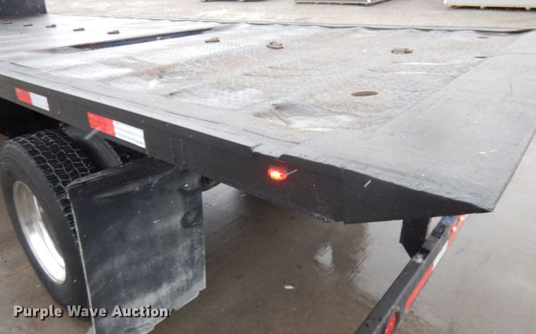 image for item KK9705 2007 Freightliner Business Class M2  rollback truck