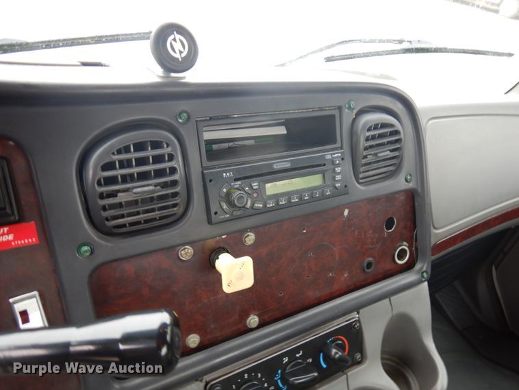 image for item KK9705 2007 Freightliner Business Class M2  rollback truck