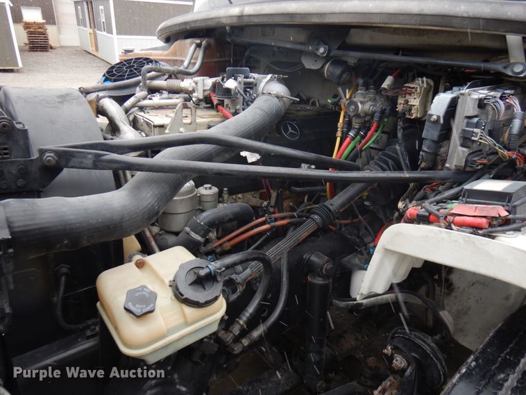 image for item KK9705 2007 Freightliner Business Class M2  rollback truck