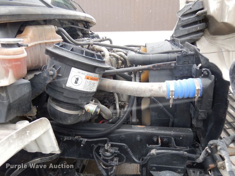 image for item KK9705 2007 Freightliner Business Class M2  rollback truck