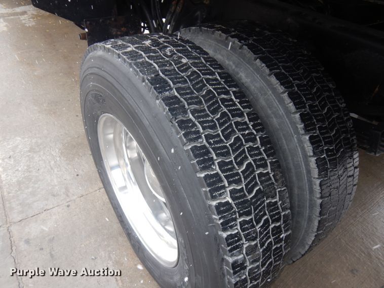 image for item KK9705 2007 Freightliner Business Class M2  rollback truck