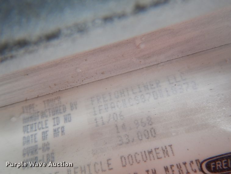 image for item KK9705 2007 Freightliner Business Class M2  rollback truck