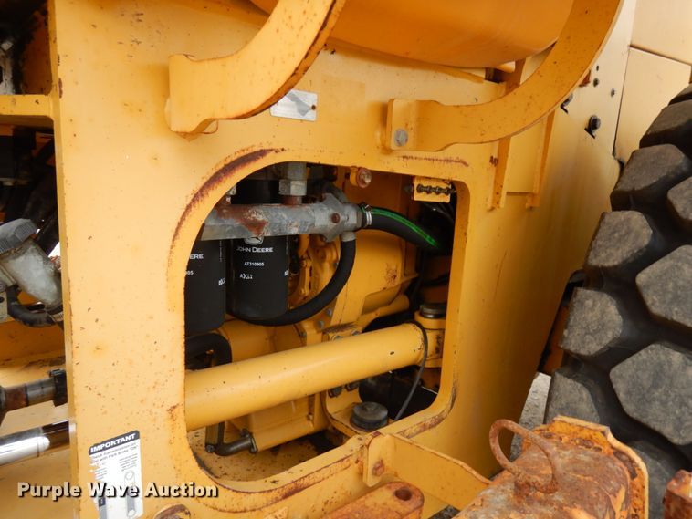 image for item KK9711 2003 John Deere 744J  wheel loader