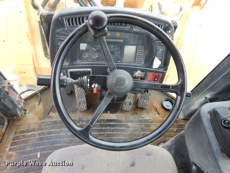 image for item KK9711 2003 John Deere 744J  wheel loader