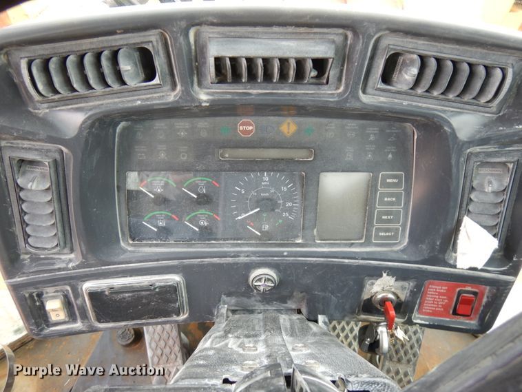 image for item KK9711 2003 John Deere 744J  wheel loader