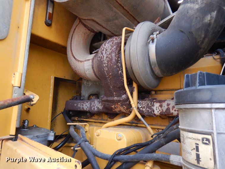 image for item KK9711 2003 John Deere 744J  wheel loader