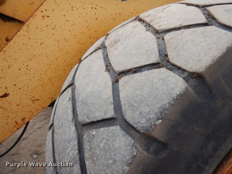 image for item KK9711 2003 John Deere 744J  wheel loader