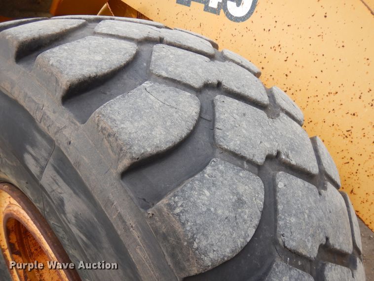 image for item KK9711 2003 John Deere 744J  wheel loader