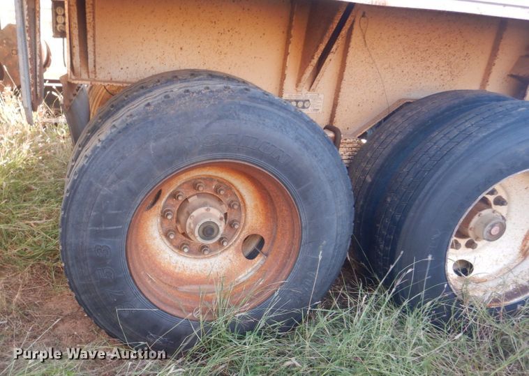 image for item KO9747 1999 Midland MG4OCLAM  bottom dump trailer