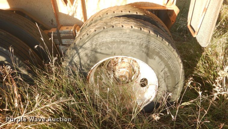 image for item KO9747 1999 Midland MG4OCLAM  bottom dump trailer