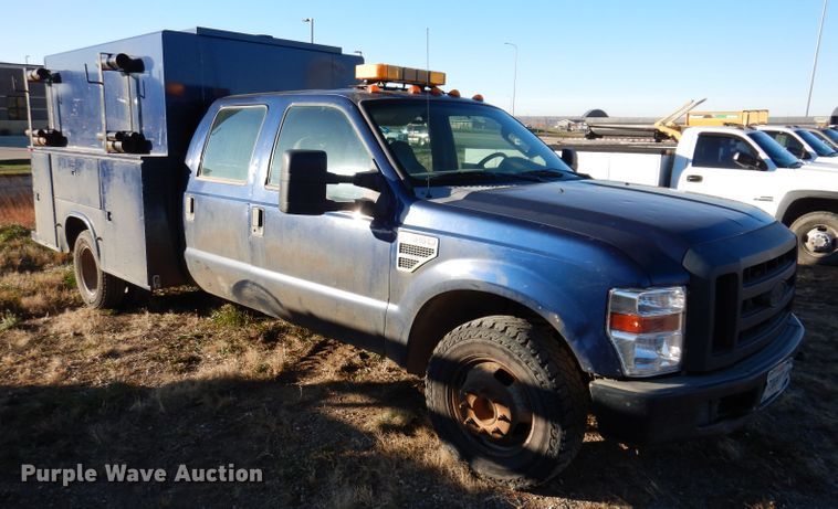 image for item DL5828 2008 Ford F350 Super Duty  Crew Cab utility bed pickup truck