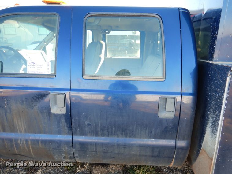 image for item DL5828 2008 Ford F350 Super Duty  Crew Cab utility bed pickup truck