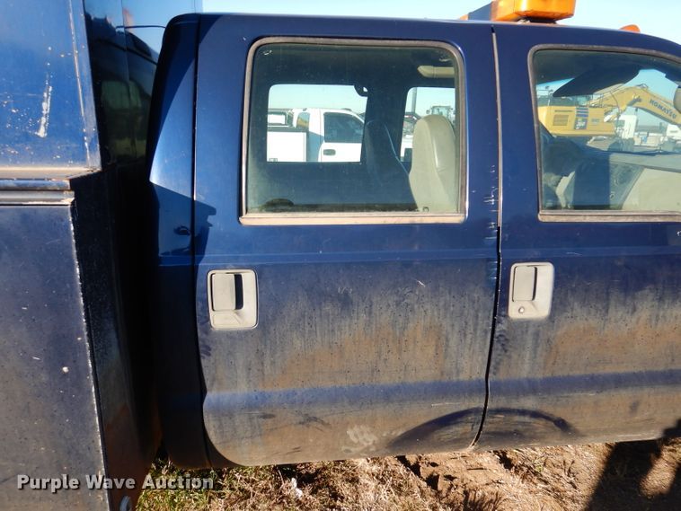 image for item DL5828 2008 Ford F350 Super Duty  Crew Cab utility bed pickup truck