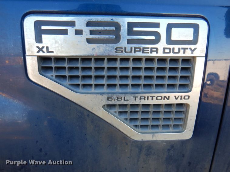 image for item DL5828 2008 Ford F350 Super Duty  Crew Cab utility bed pickup truck